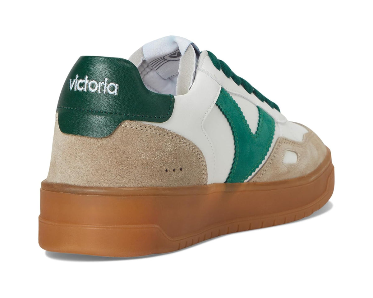 Back view of white sneakers with green heel panel, tan suede overlay, lace-up