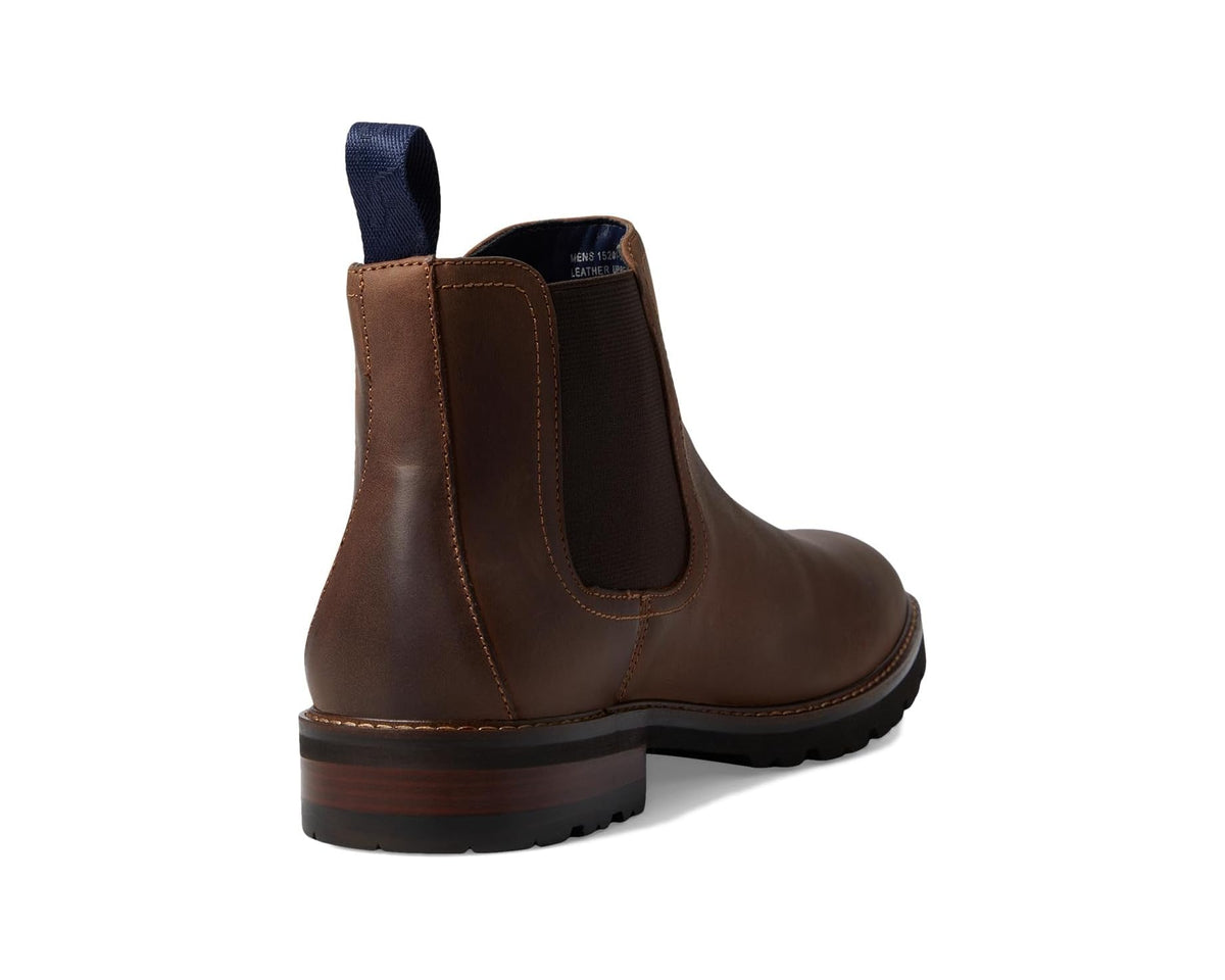 Men's brown leather gore chelsea boot, back view with elastic gore panel and stacked heel