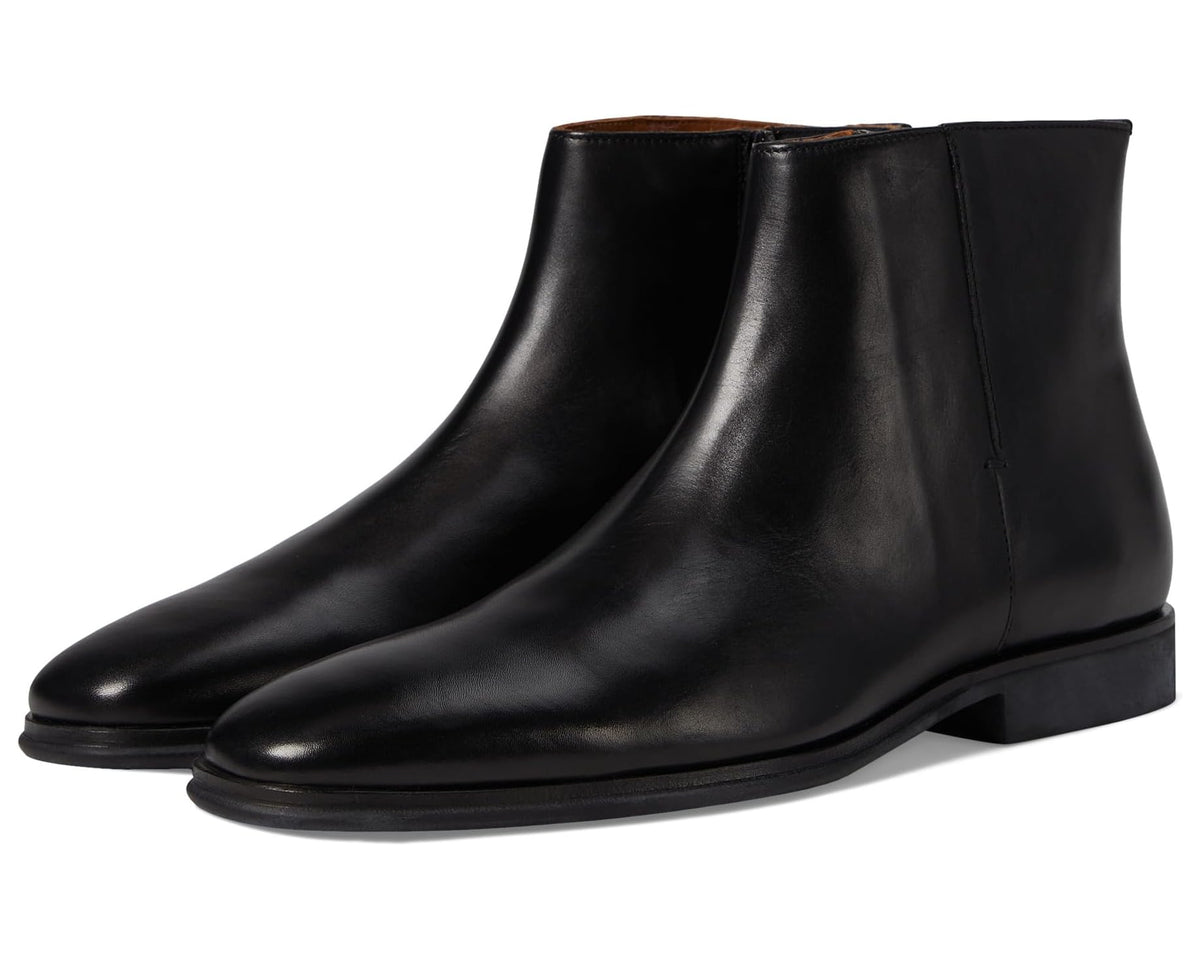 Black leather ankle boots with rounded toe and low stacked heel