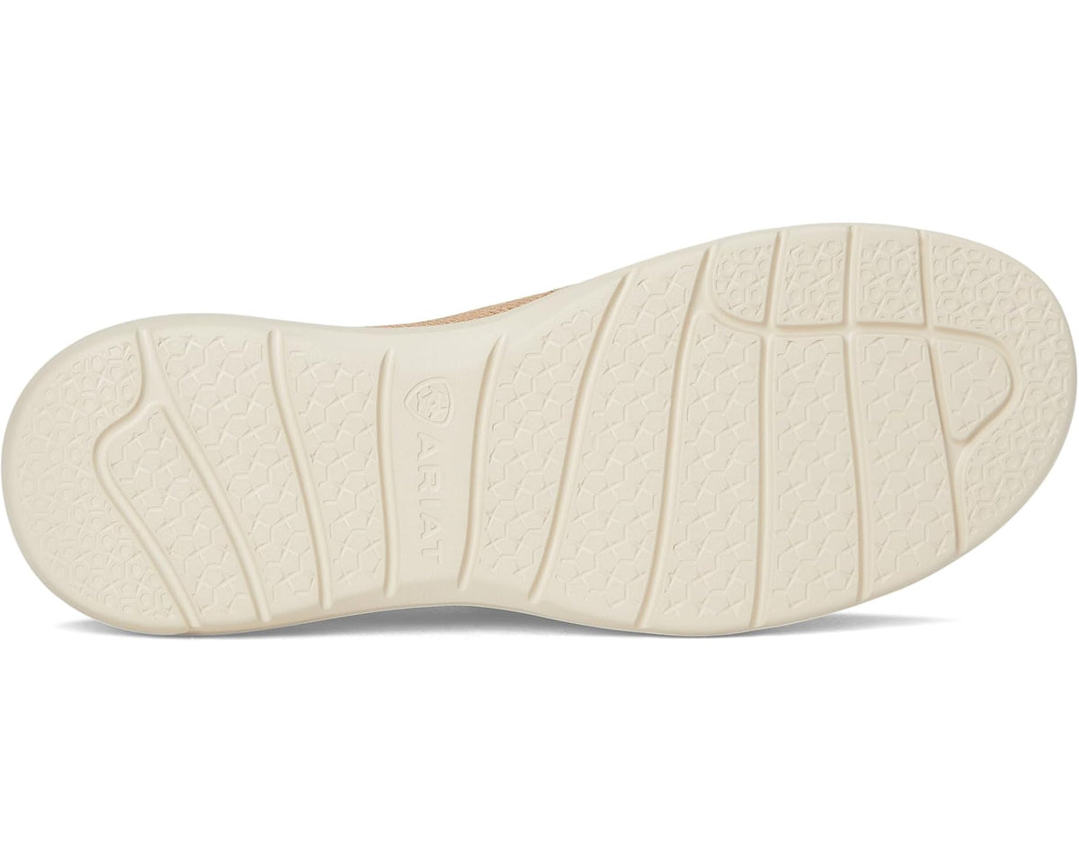 Light tan knit shoe outsole with textured traction tread