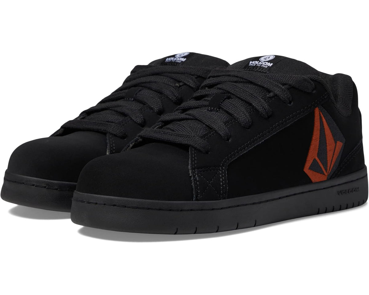 Black low-top lace-up sneakers with red Volcom logo on side