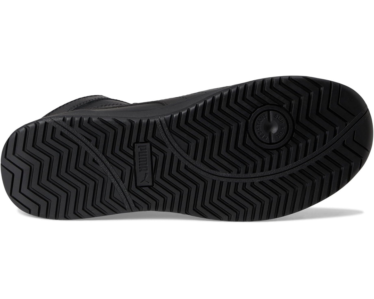 Black rubber outsole of men's PUMA safety mid sneaker with zigzag tread pattern.