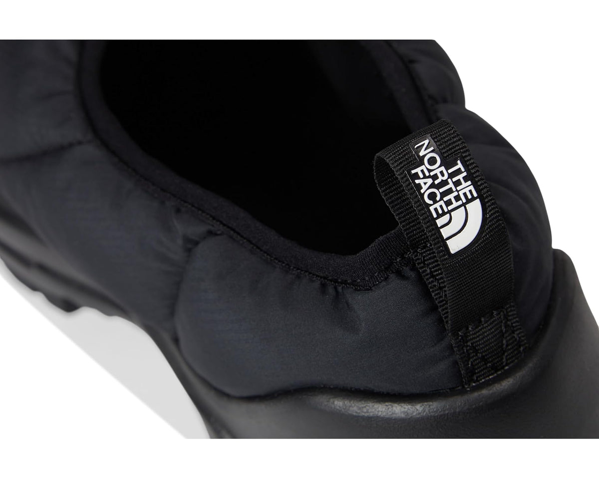 Black heel strap with The North Face logo and fabric loop on insulated mule