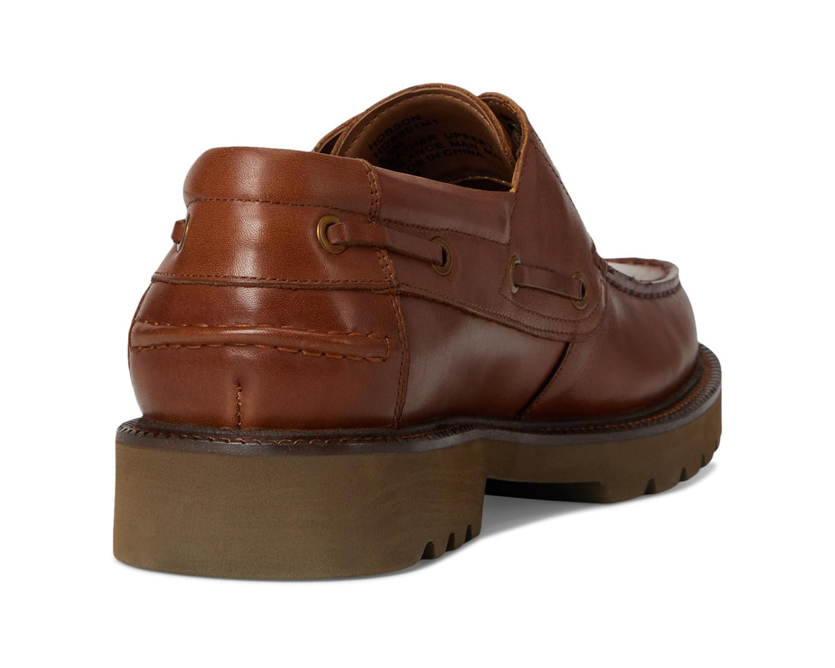 Men's tan leather boat shoe heel view with padded back and platform tread