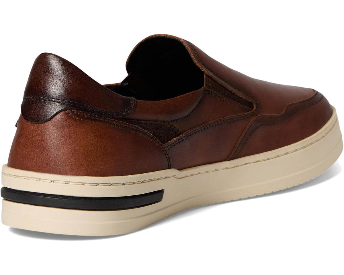 Back view of brown leather slip-on shoe with black interior lining