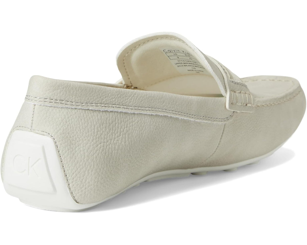 Light-colored slip-on loafer heel with CK branding and cushioned insole