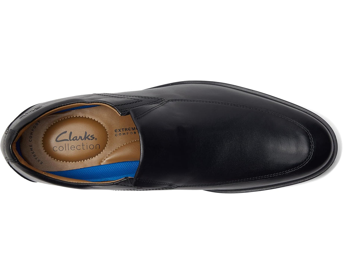 Men's black leather slip-on shoe, visible interior lining and cushioned insole