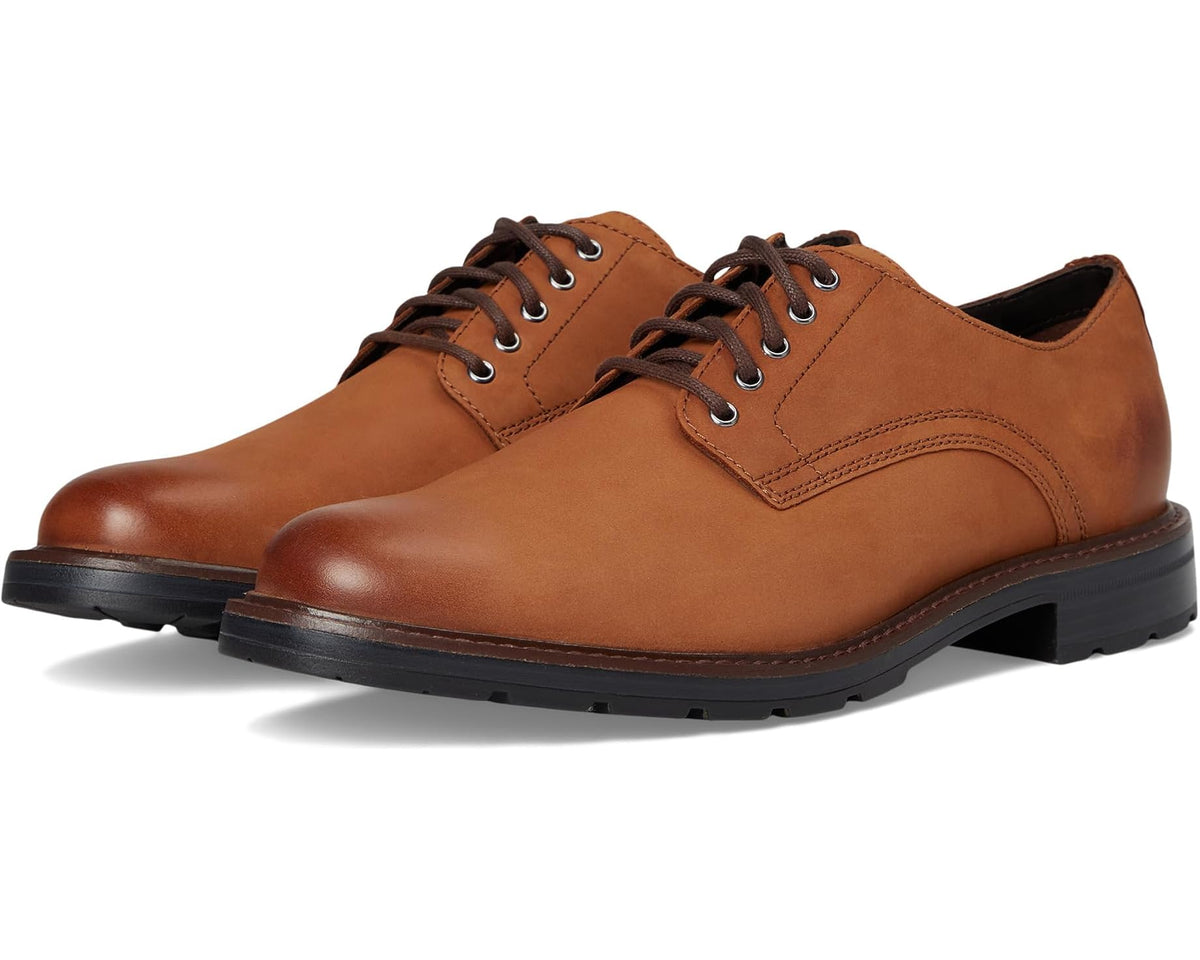 Men's tan nubuck lace-up oxfords with plain toe and black rubber sole