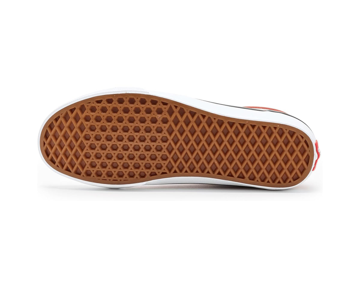 Rust bronze outsole of Vans Old Skool low-top sneaker with waffle tread pattern