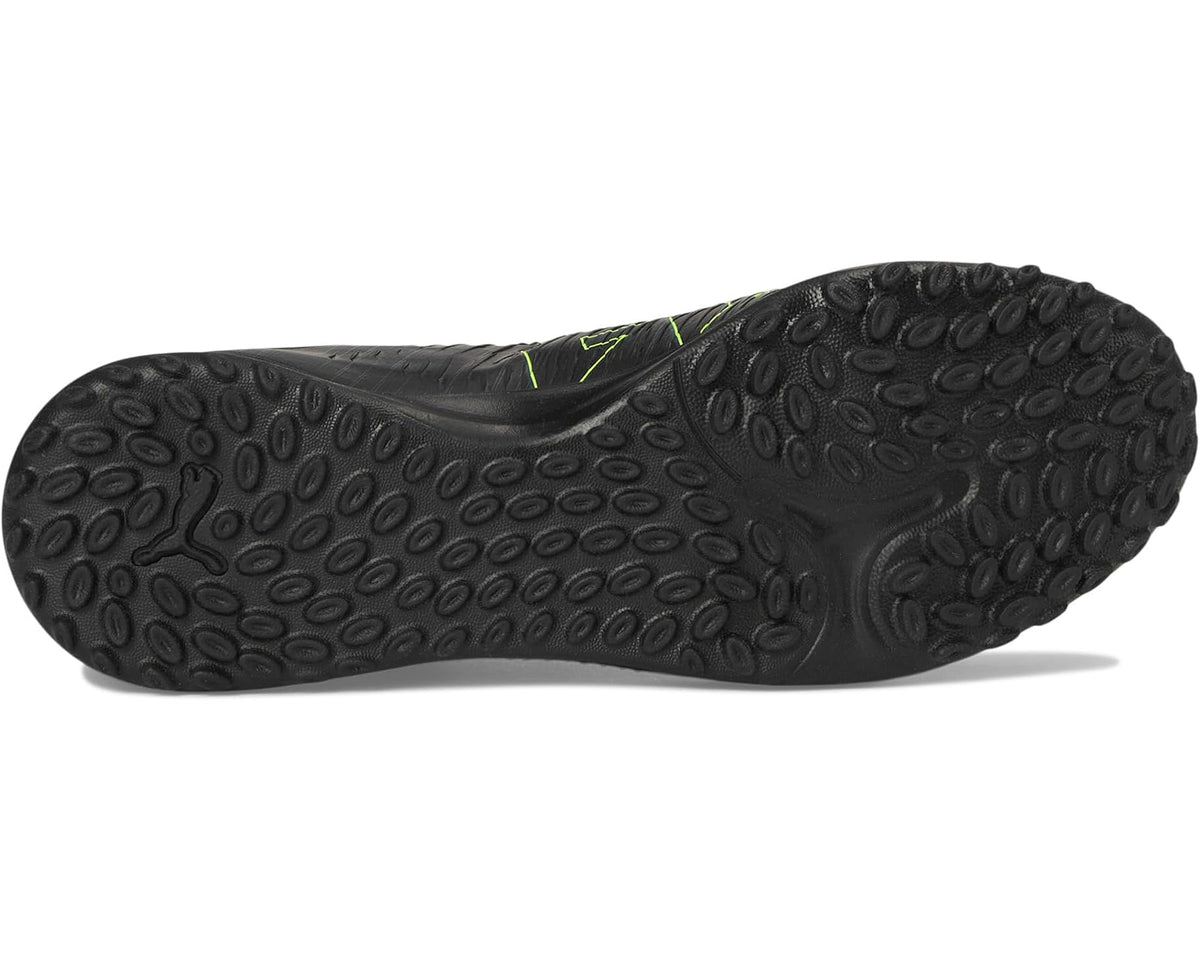 Men's PUMA turf trainer cleats—black rubber outsole with turf studs and textured traction