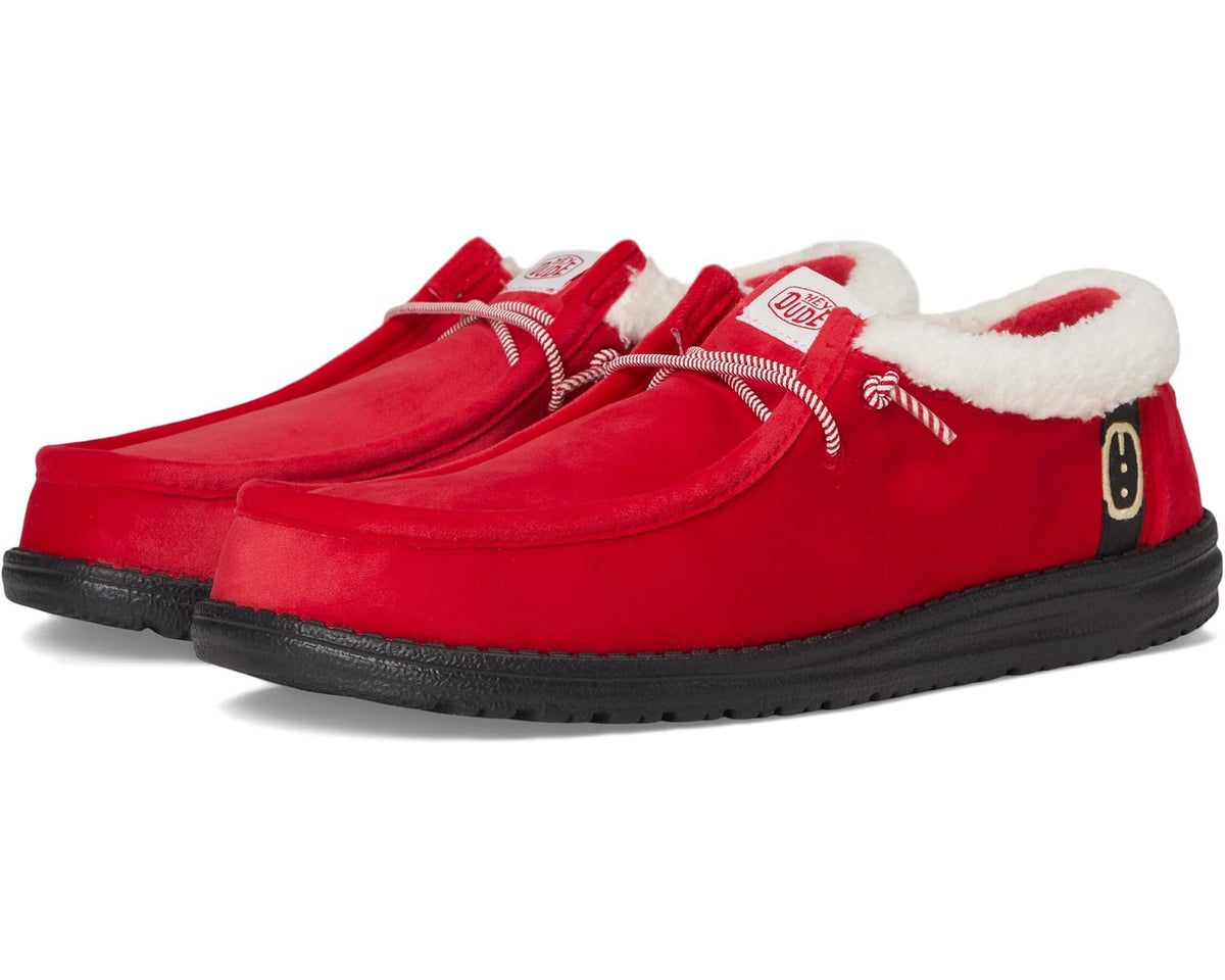 Men's red Hey Dude slip-on loafer with white faux-fur trim and Santa hat graphic