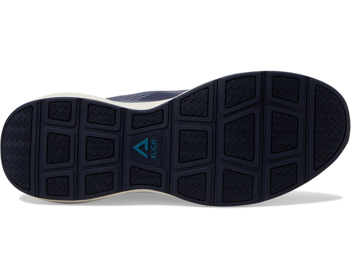 Men's washed indigo sneakers outsole view with patterned tread and ALIGN logo