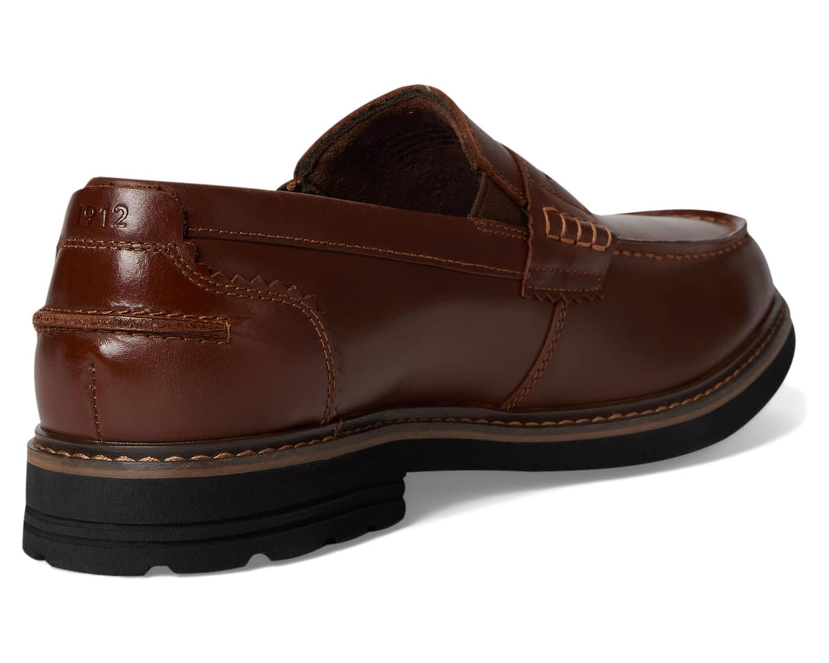Cognac penny loafer heel with moc-toe stitching and padded collar opening