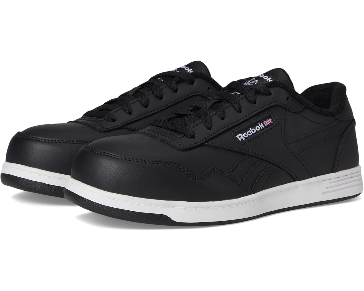 Men's black work sneakers with white sole and Reebok logo detail