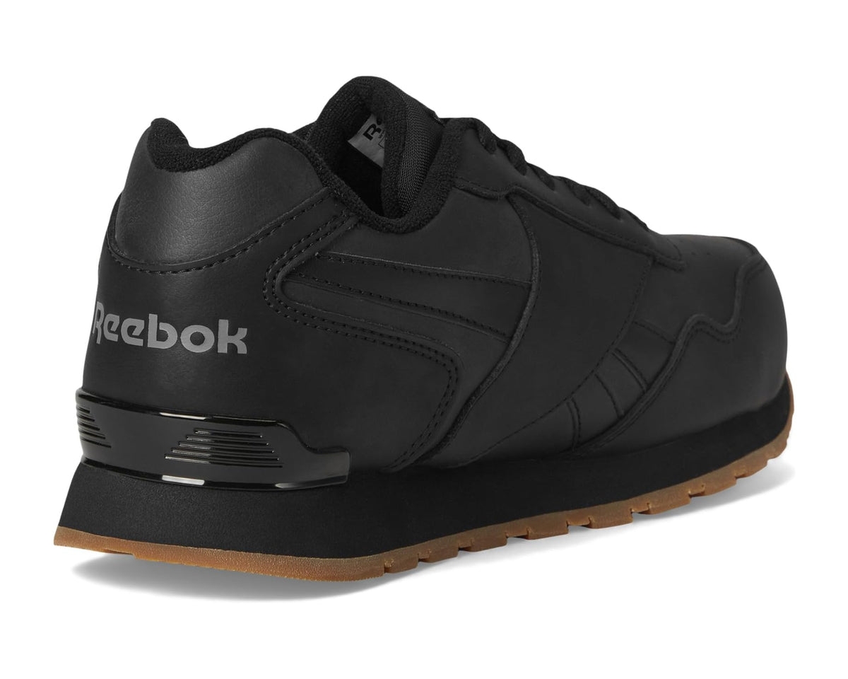 Black Reebok work shoe with heel detail and lace-up closure