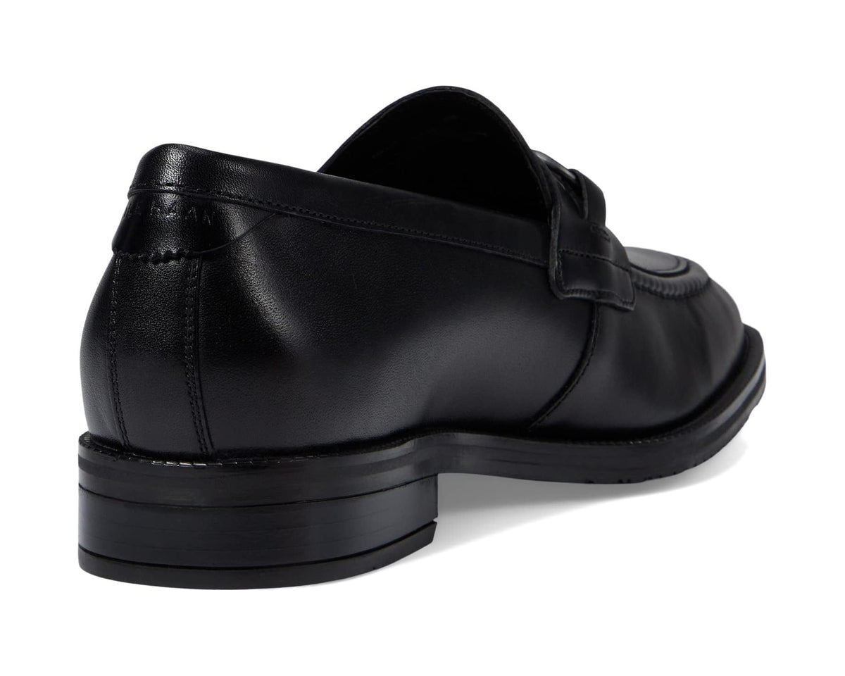 Black leather loafer back view with smooth heel counter and side seam