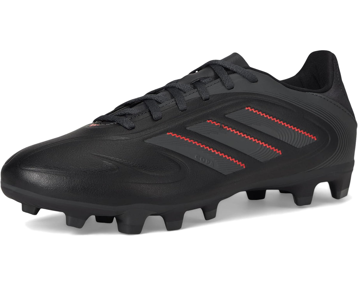 Unisex black soccer cleats with red accent stripes and molded firm-ground studs