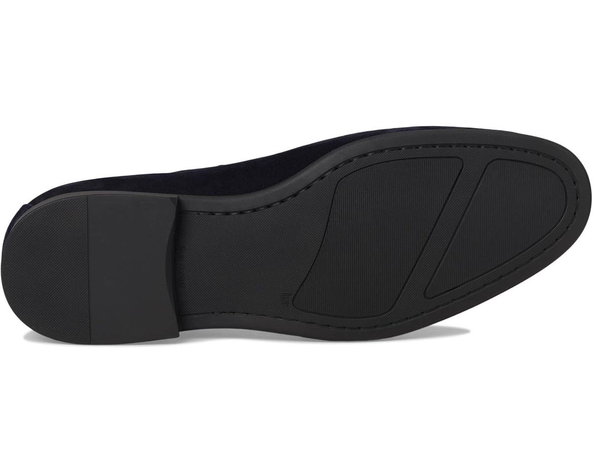 Navy suede slip-on loafer outsole with textured rubber and low block heel