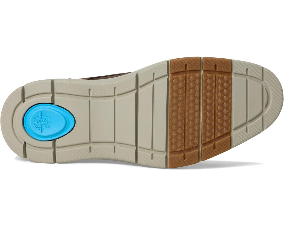 Brown rubber outsole with tread pattern and blue logo insert