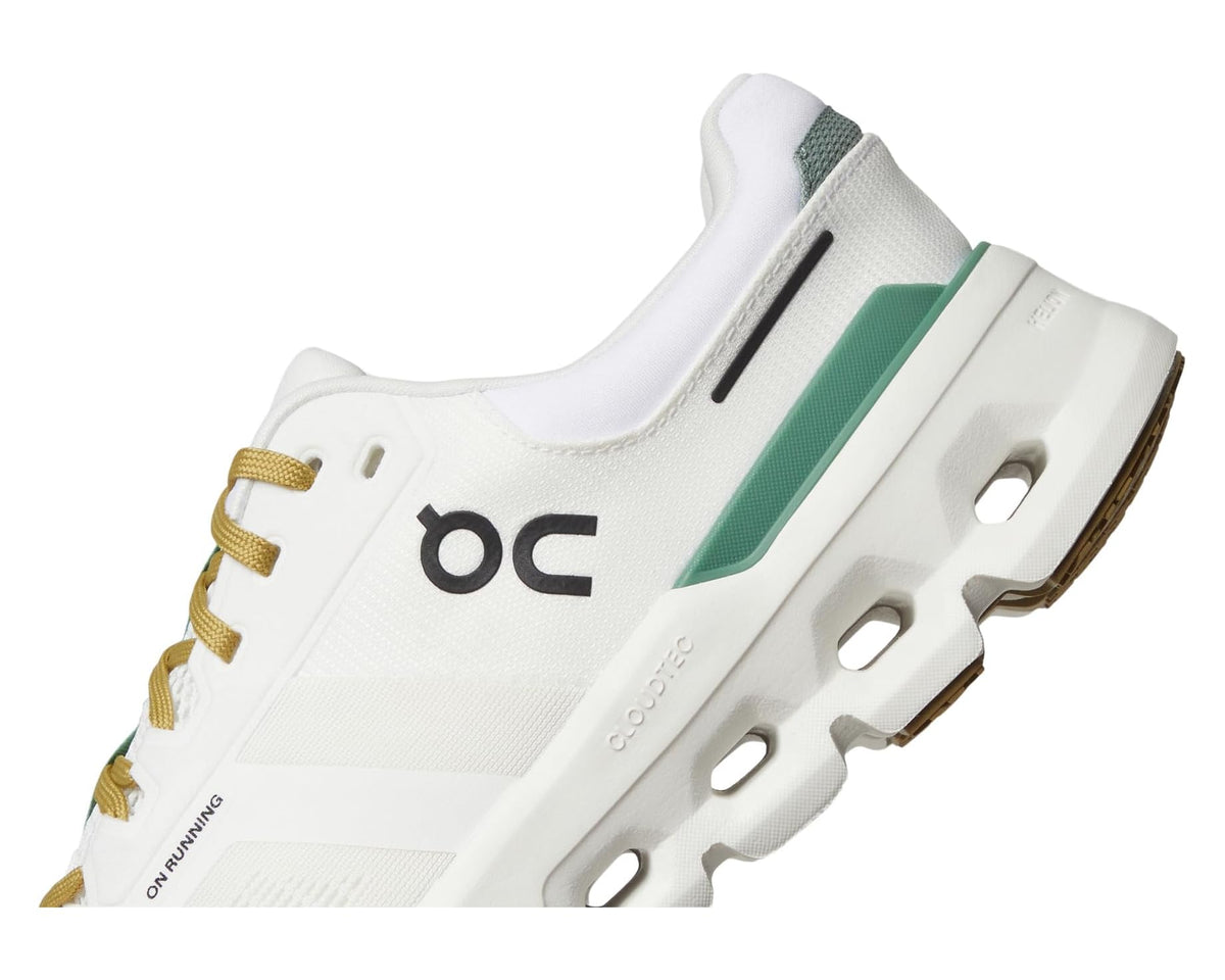 Men's white running shoe side view with on logo, green stripe, and molded sole pods