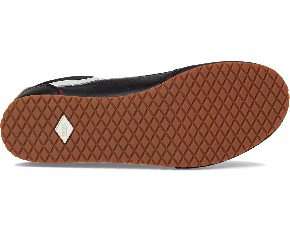 Vans unisex sneaker outsole with brown gum tread and sidewall detail