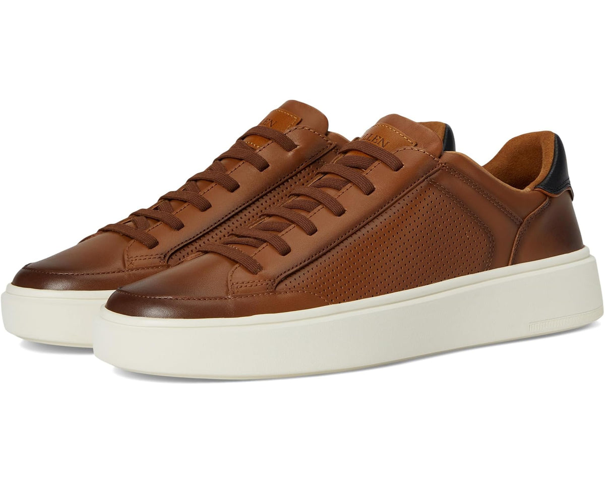 Tan leather lace-up sneaker with perforated upper and white rubber sole