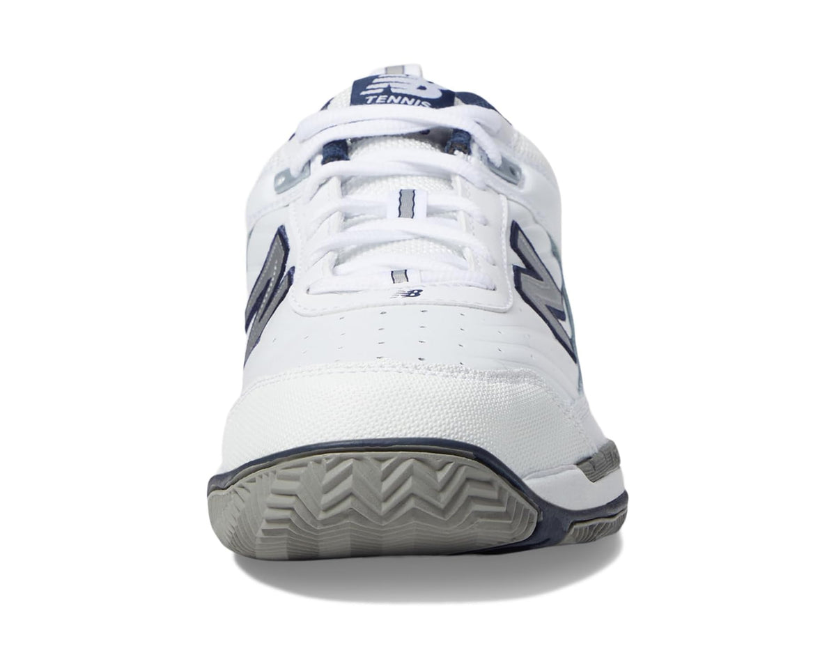 White tennis shoe back view with New Balance branding and padded collar