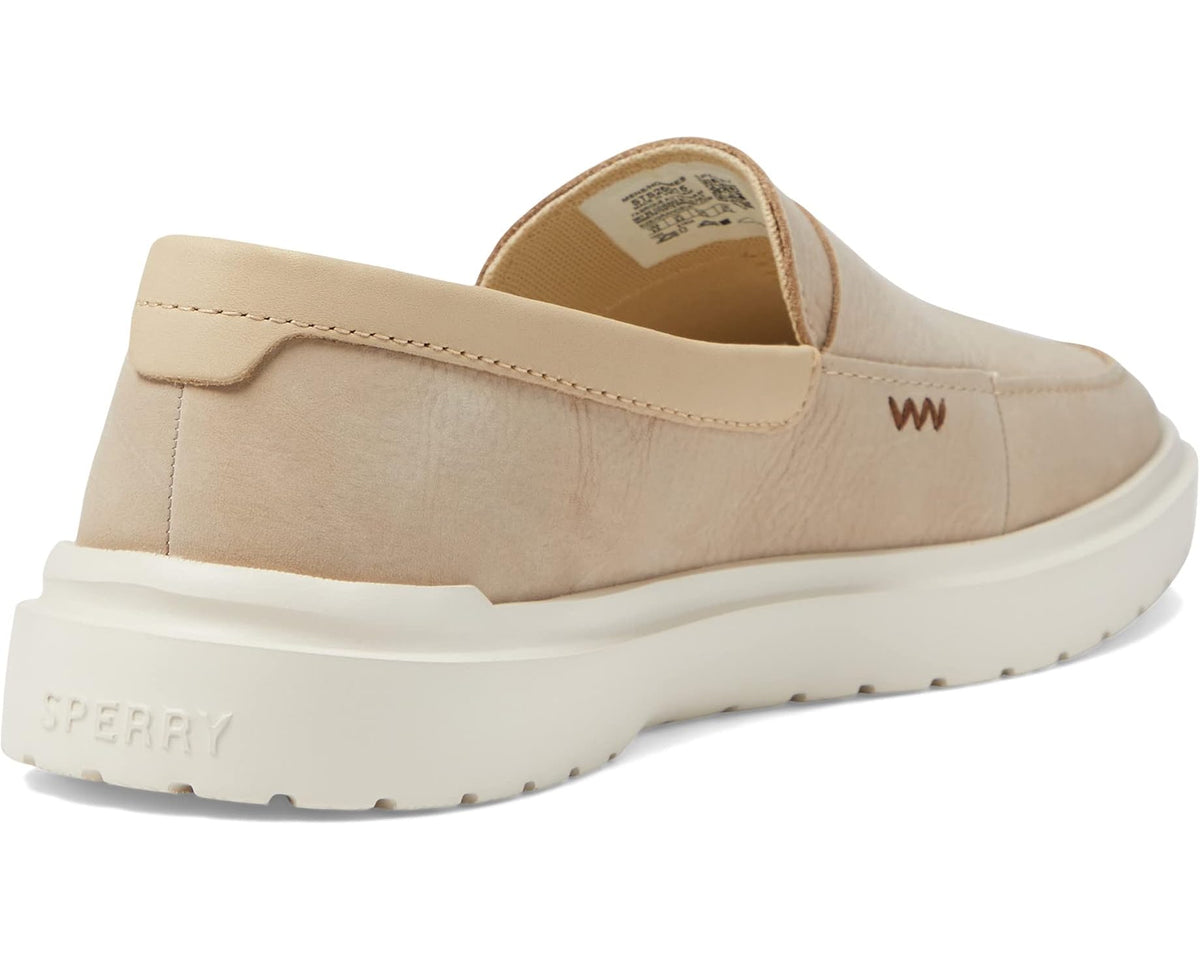 Men's sand suede penny loafer heel view with stacked sole and branding