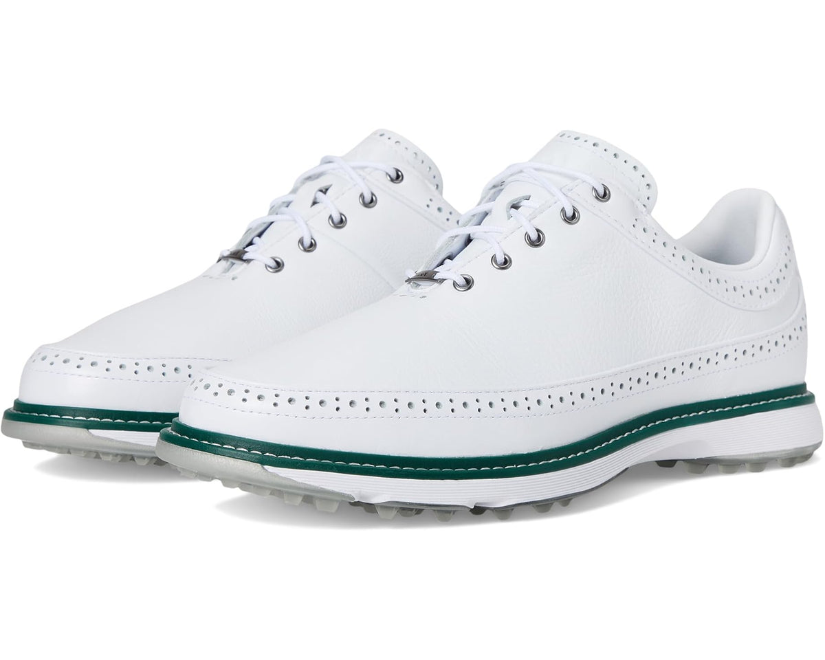 Unisex spikeless golf shoes with white uppers and green sole edge trim