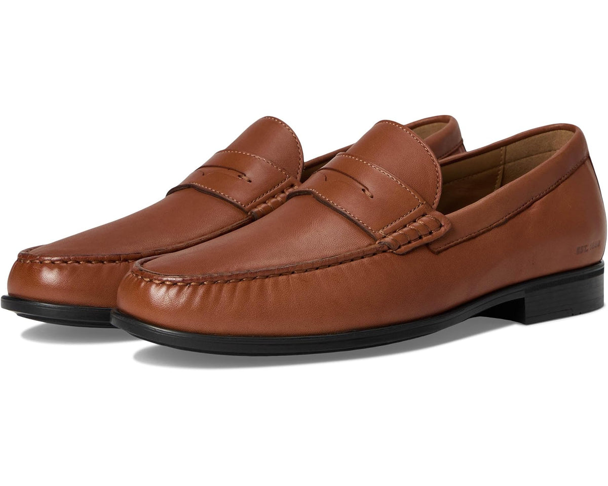 Cognac leather penny loafer with moc-toe stitching and penny strap