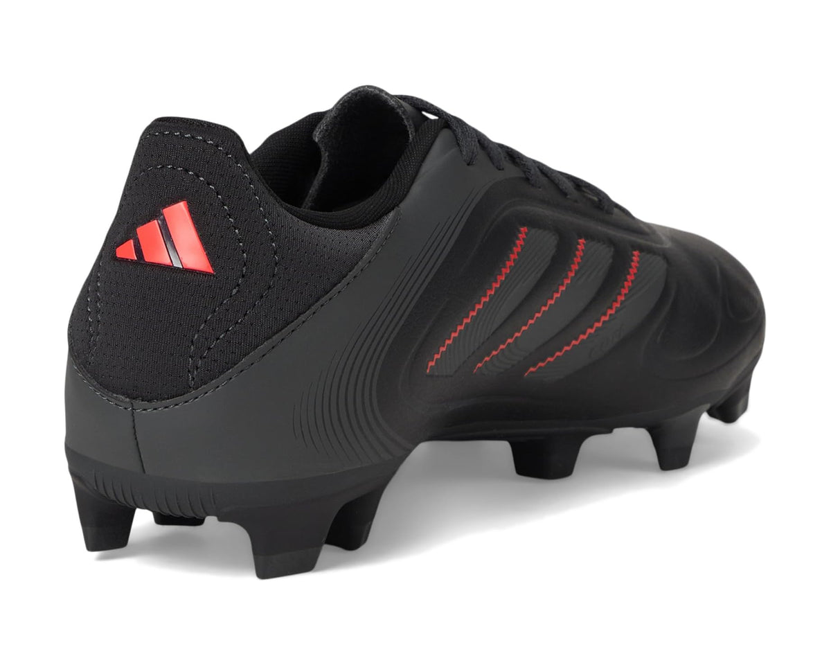 Black soccer cleats with heel pull tab and red accent stripes; firm-ground studs