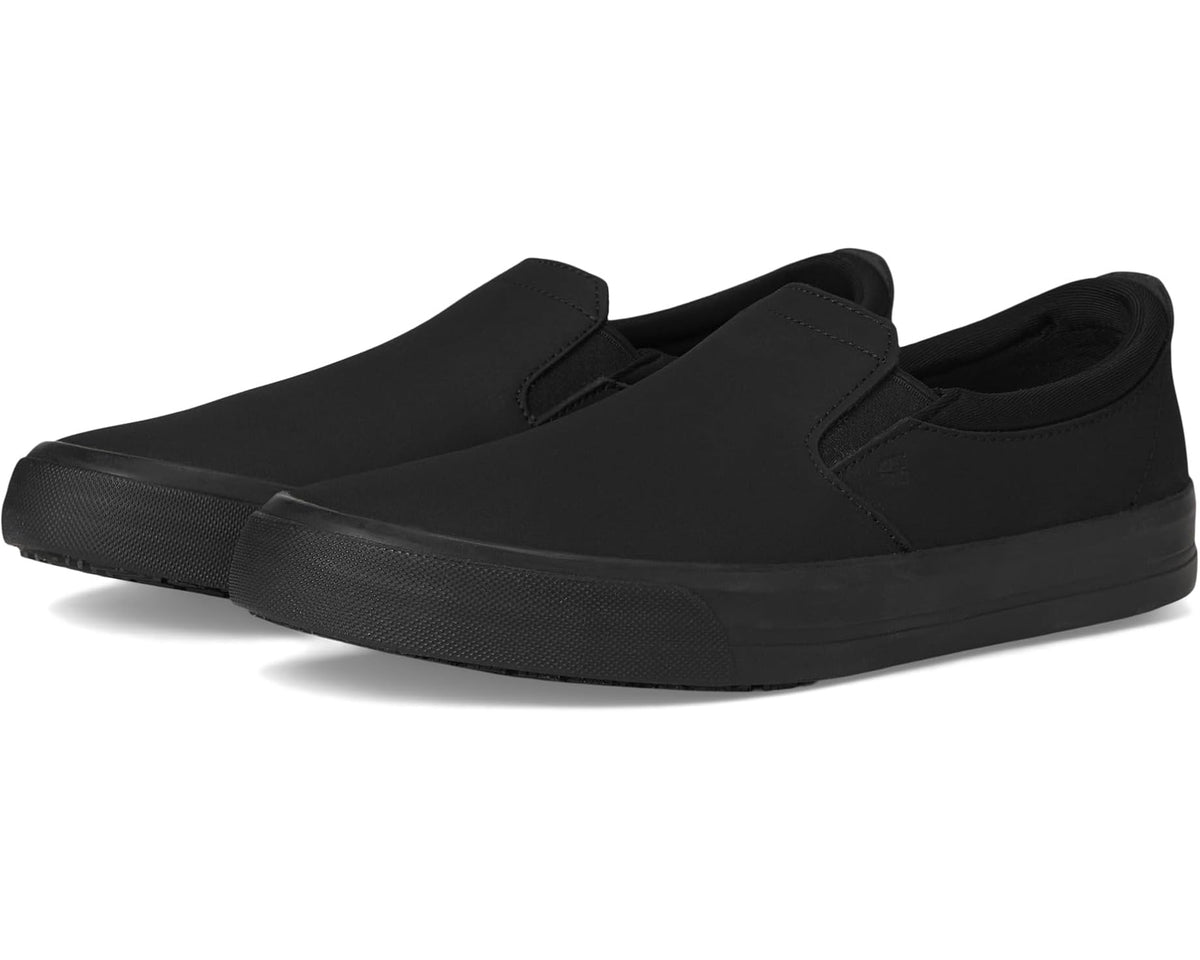 Black slip-on shoes with low-profile rubber sole and side gore