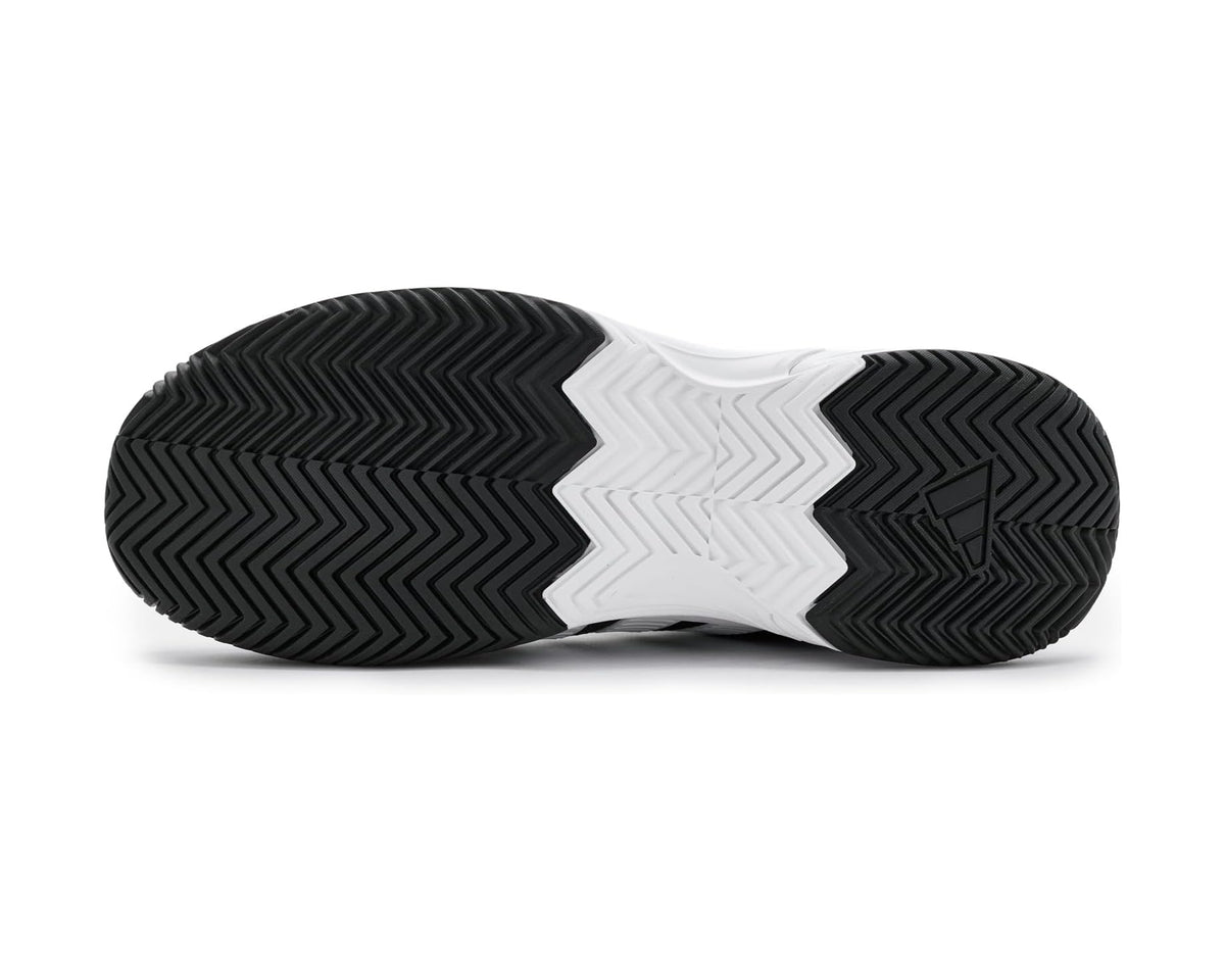 Black and white adidas tennis shoe outsole with zigzag tread pattern