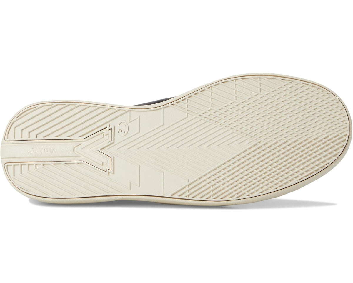 Off-white rubber outsole with textured tread pattern