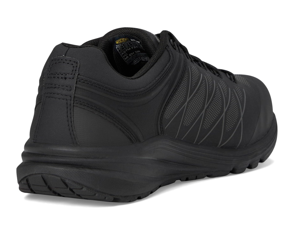 Black work sneaker heel and side panel with padded collar and grippy outsole