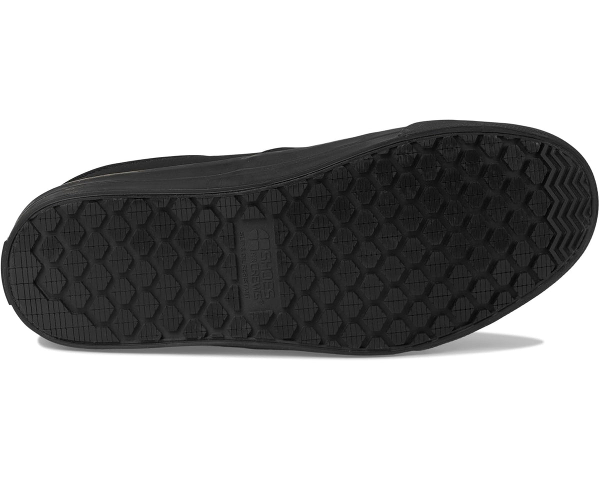 Black rubber outsole with textured traction tread pattern