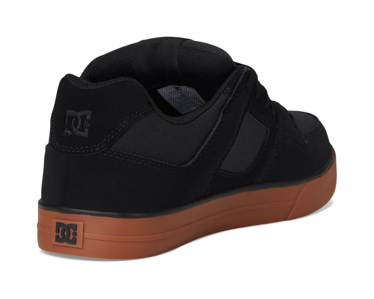 Black work sneaker back view with padded collar and brown gum side label