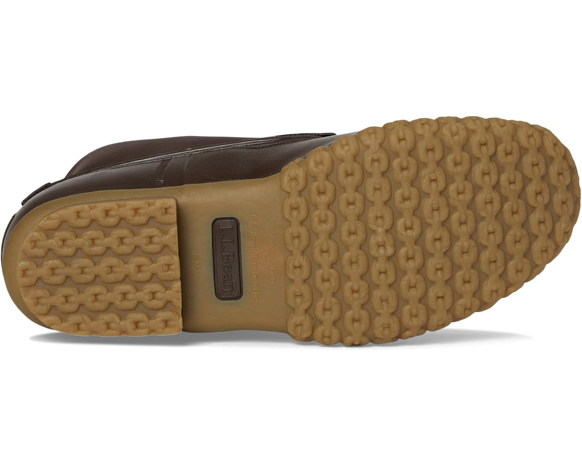 Brown Bean boot outsole view with tan tread and side logo patch on the foot.