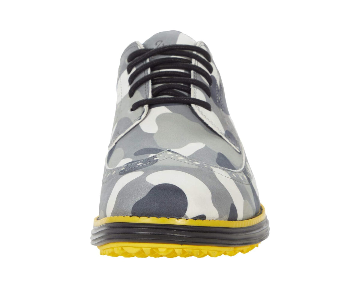 Gray camo lace-up golf oxford shoe front, low-profile toe and yellow outsole edge