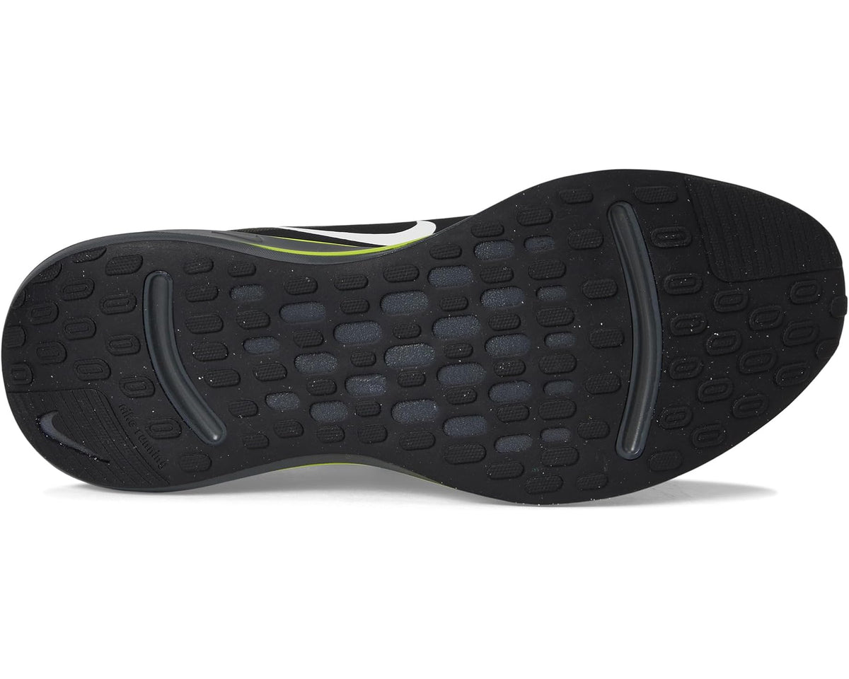 Black rubber outsole with textured tread and gray swoosh-shaped support