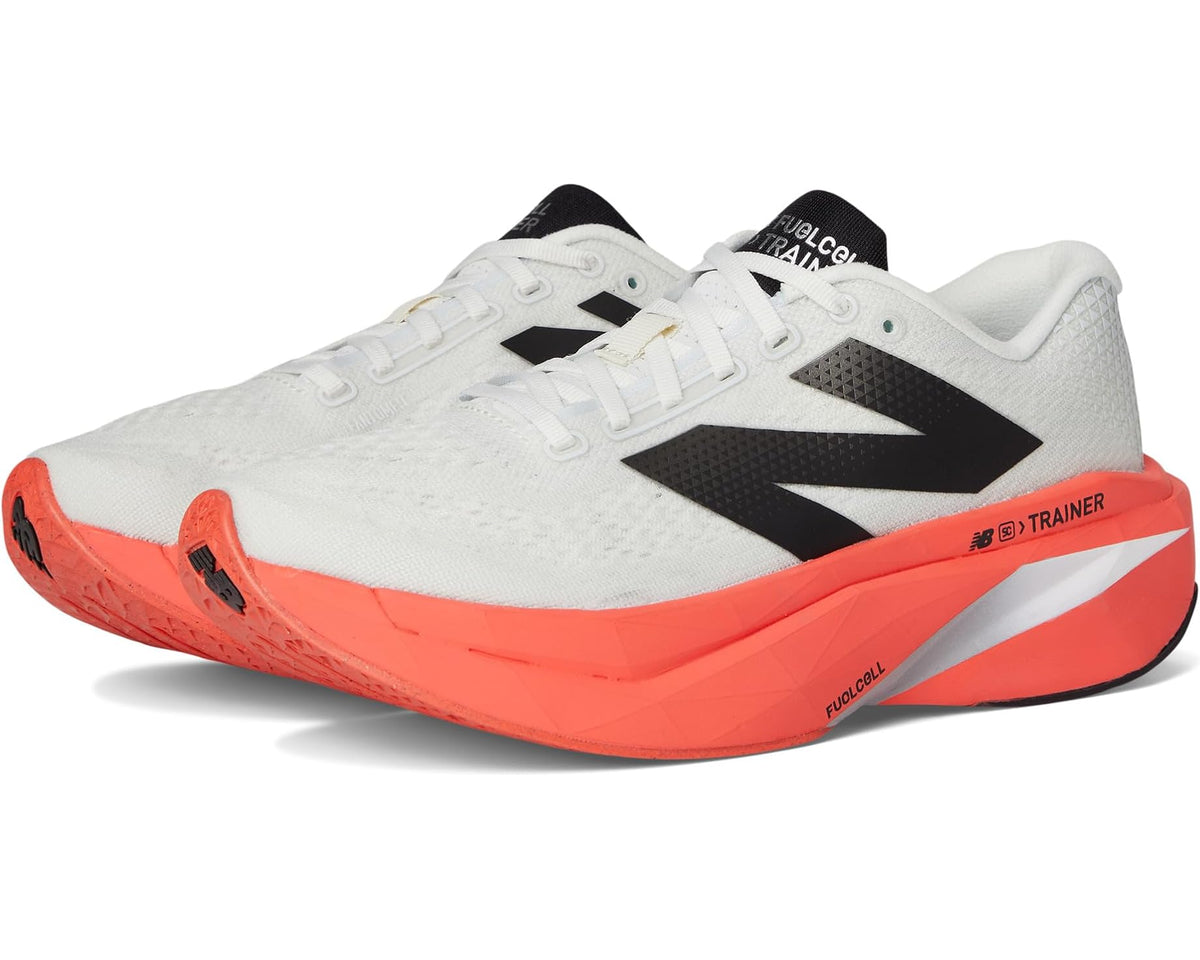 New Balance FuelCell trainer shoe for men, white knit upper with black and orange accents