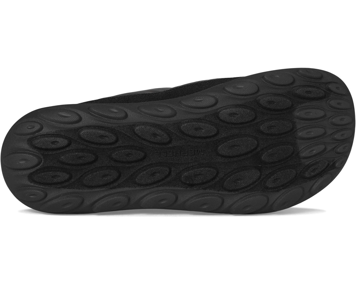 Black rubber outsole with circular tread pattern for traction