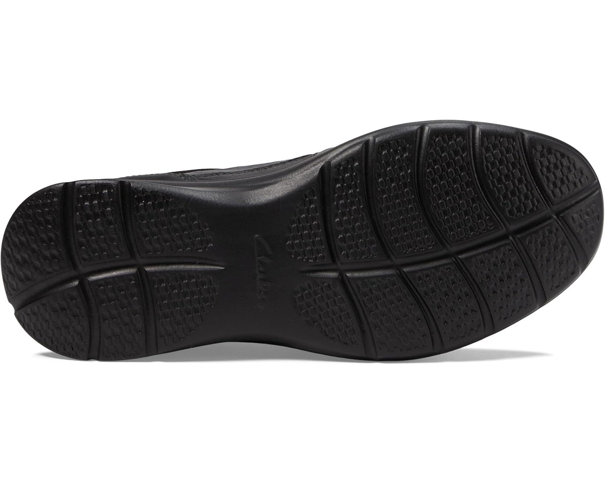 Clarks men's black leather slip-on shoe outsole with textured tread for grip