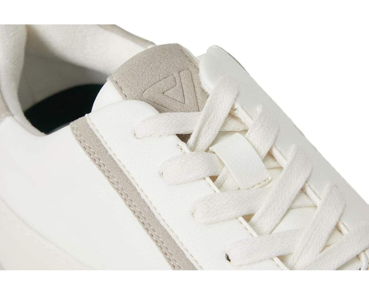 Men's sneaker lace-up close-up, white laces and upper with beige trim