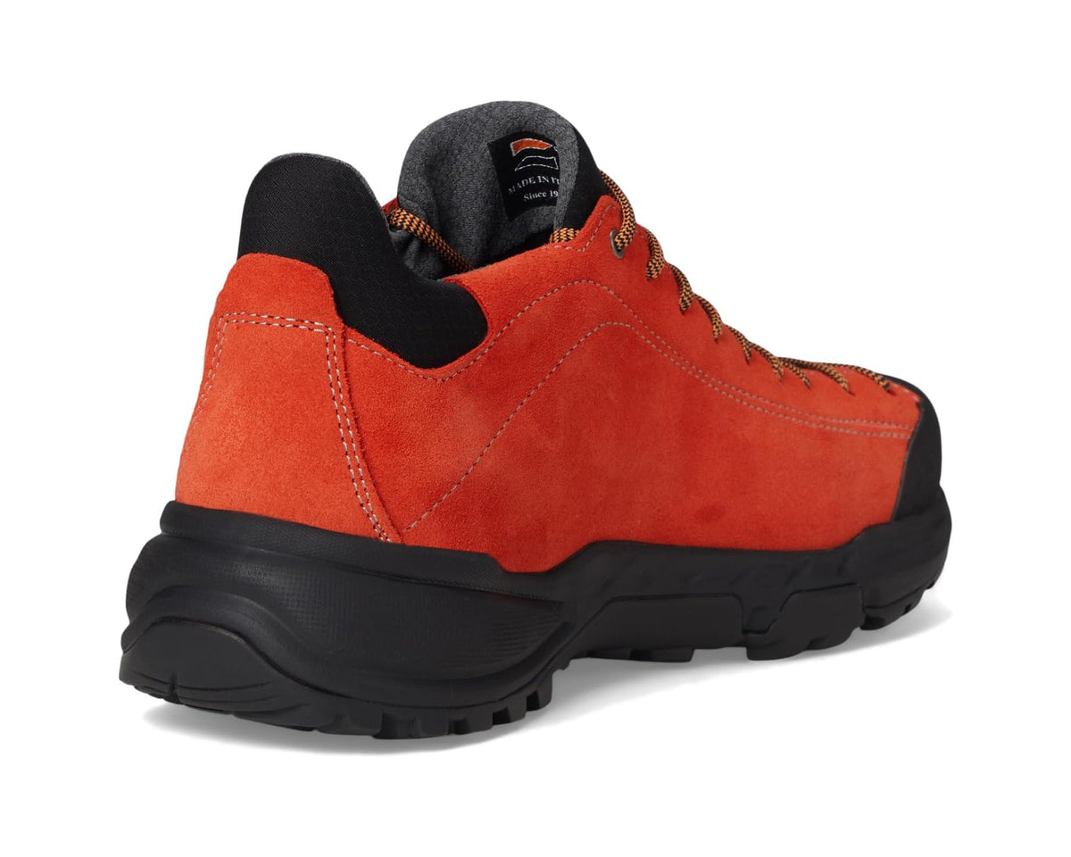 Orange suede hiking shoe heel and collar with black rubber midsole and lace details