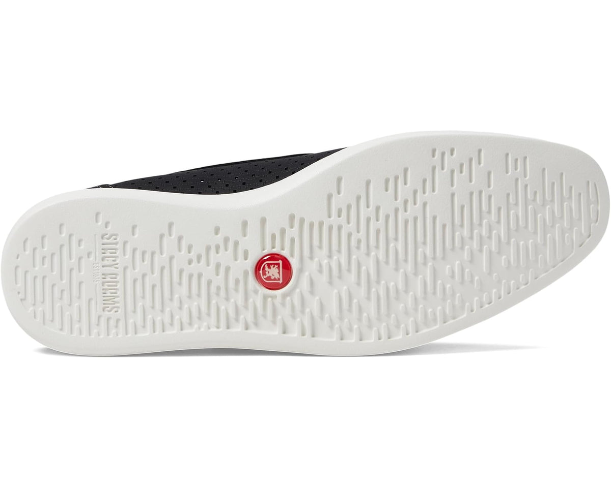 Black slip-on loafer outsole with white traction tread and center logo badge