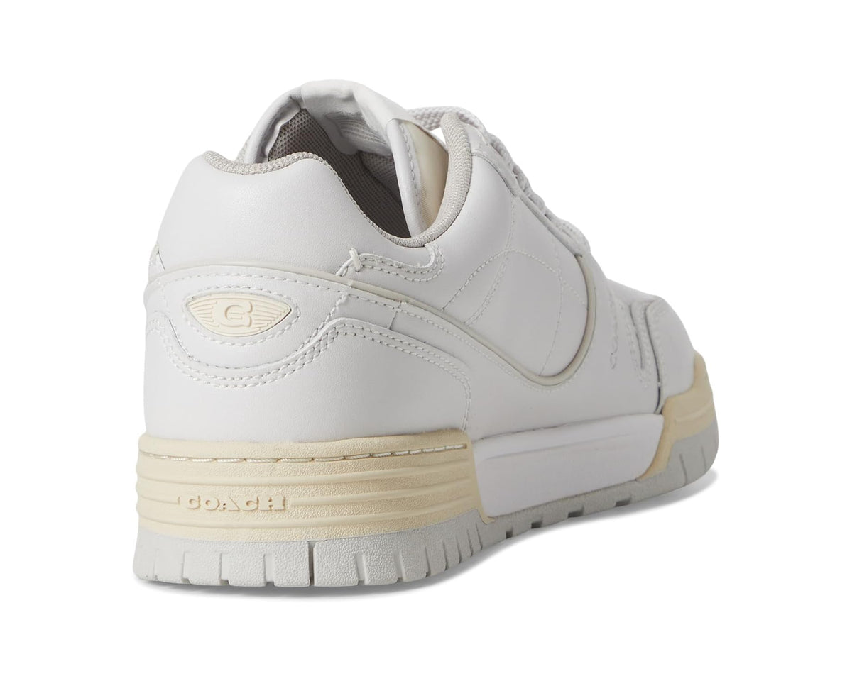 Heel and side view of optic white sneaker with lace-up, padded collar, and gum sole