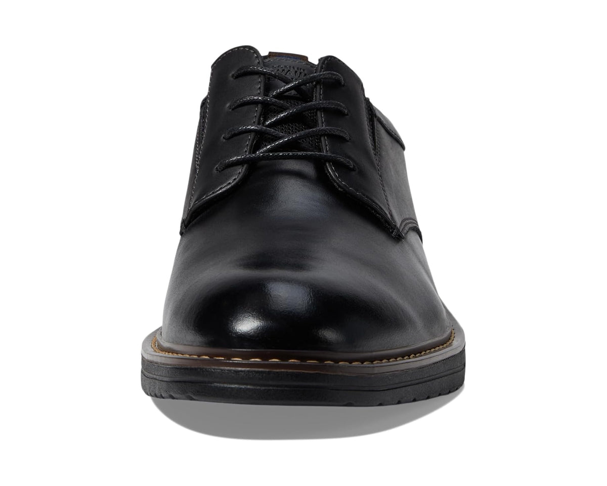 Black leather lace-up oxford with rounded toe and low-profile rubber sole
