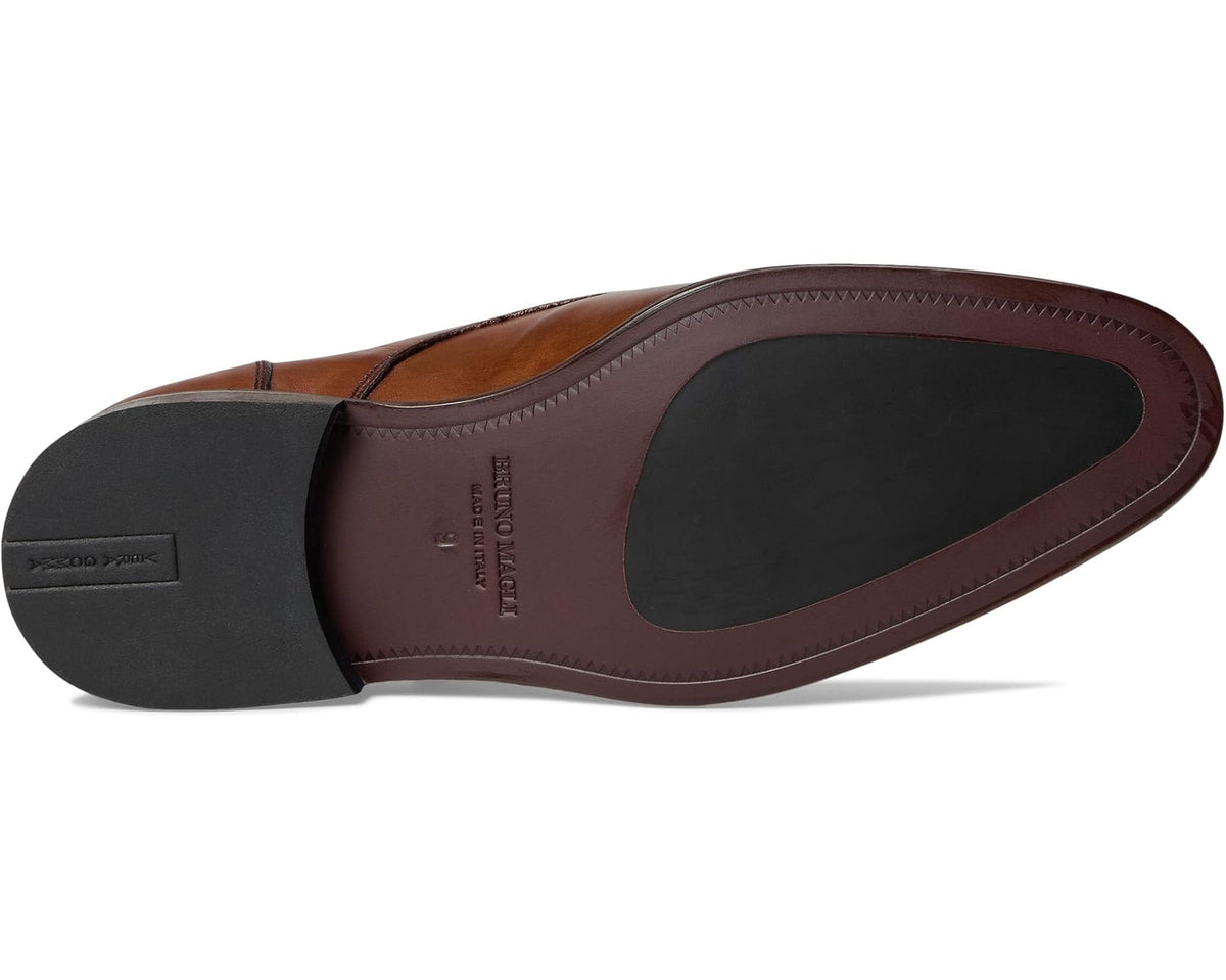 Men's brown leather monk strap dress shoe outsole view