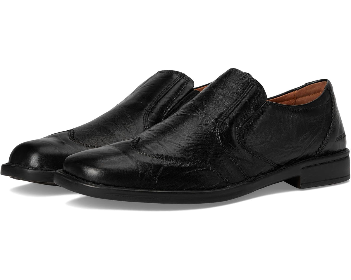 Men's black leather slip-on shoe with stitched strap detail